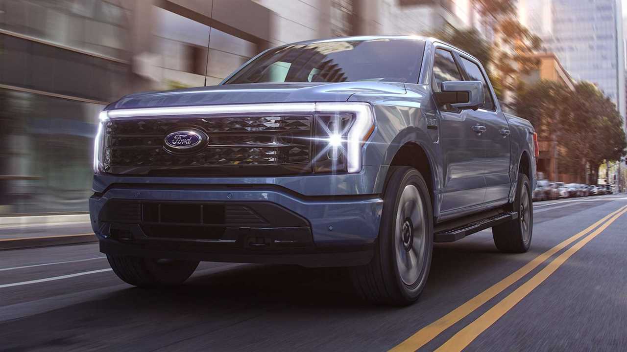 2022 Ford F-150 Lightning electric pickup truck driving in city